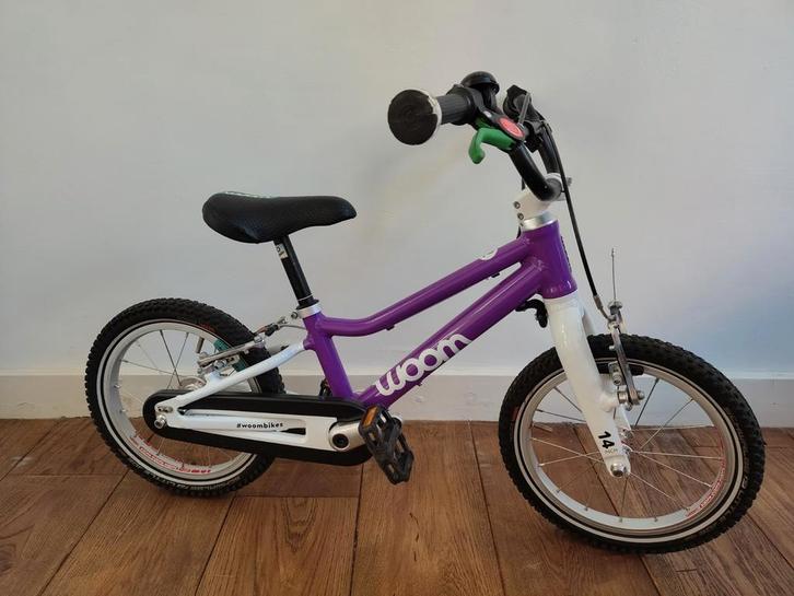 Woom 2 kinderfiets - paars - 14 inch, Fietsen en Brommers, Fietsen | Jongens, Zo goed als nieuw, 14 inch of minder, Handrem, Ophalen