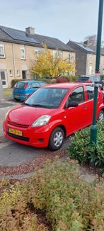 Daihatsu Sirion 1.0 51KW 2007 Rood, Auto's, Voorwielaandrijving, Stof, Handgeschakeld, Airbags