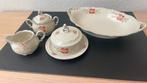 Gedeelte servies met bloemetje, Ophalen