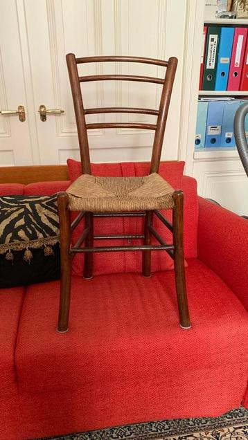 Antieke rieten eettafel stoel beschikbaar voor biedingen