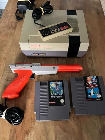 Nintendo NES 8-Bit console met games en zapper beschikbaar voor biedingen