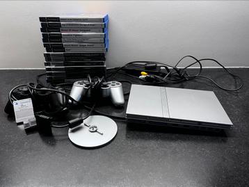 COMPLEET PlayStation 2 SLIM met 2 controllers en 14 games beschikbaar voor biedingen
