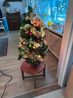 Versierde kerstboom, Ophalen