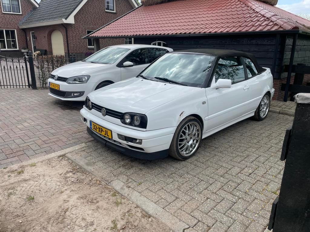 Volkswagen Golf 1.8 Cabriolet 55KW E2 1997 Wit, Auto's, Volkswagen, Voorwielaandrijving, 74 pk, Zwart, 4 cilinders