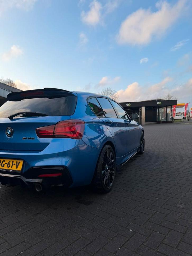 BMW 1-Serie M140i 340pk Aut 2019 Blauw, Auto's, BMW, Particulier, 1-Serie, Benzine, Hatchback, Automaat, Geïmporteerd, Blauw, Achterwielaandrijving