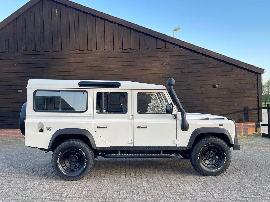 Land Rover Defender 2.5 TD5 110 Station 107.000 km, Auto's, Land Rover, Stof, Gebruikt, Standkachel, 10 km/l