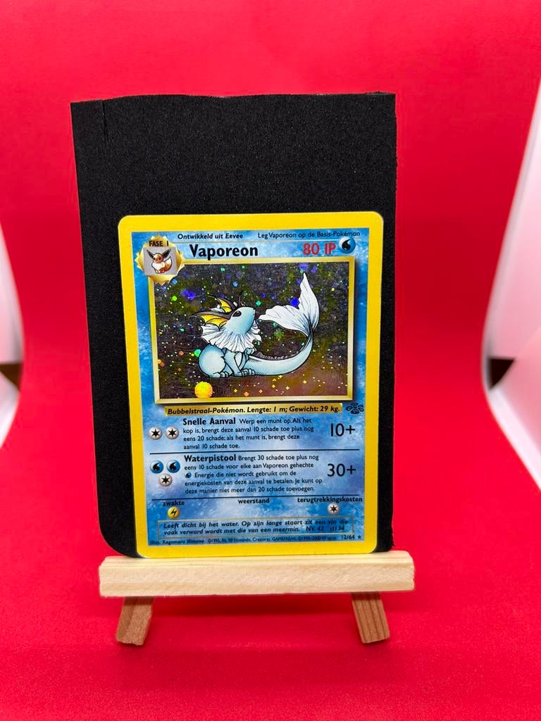 Vaporeon 28/64 Holo Jungle, Ophalen of Verzenden, Zo goed als nieuw