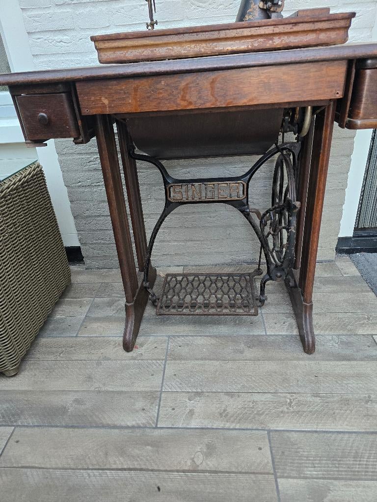 Singer trapnaaimachine, Ophalen