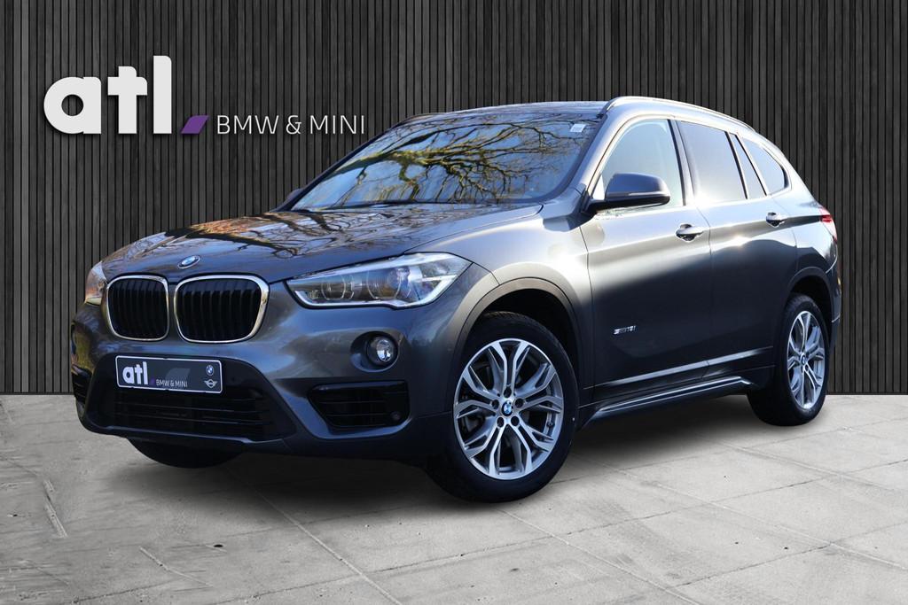 BMW X1 sDrive18i Sportline | Aut | Navi | LED | Stoelverwarm, Auto's, BMW, Stof, Gebruikt, Euro 6, Bedrijf