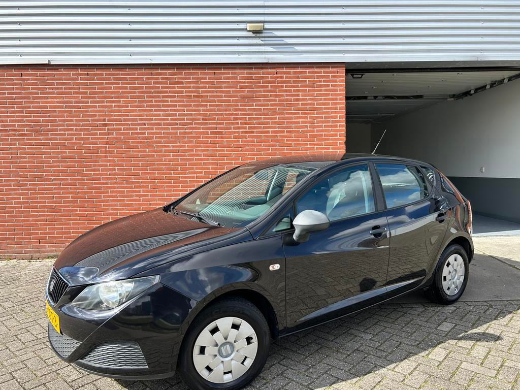 Slechts 90.372km&NAP 1e eigen Seat Ibiza 1.2 5DRS 2009 Zwart, Auto's, Voorwielaandrijving, 40 €/maand, Huisgarantie, Met garantie (alle)