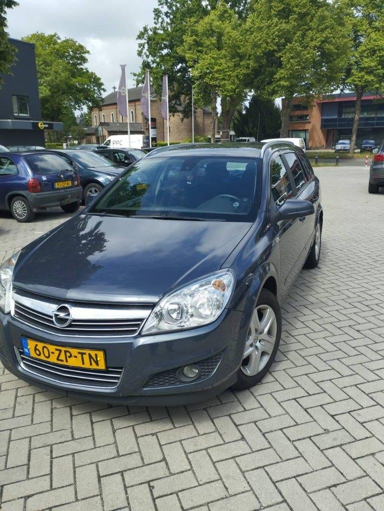Opel Astra 1.6 16V 85KW St.wgn. 2008 Grijs, Auto's, Opel, Voorwielaandrijving, 657 kg, 15 km/l, 4 cilinders