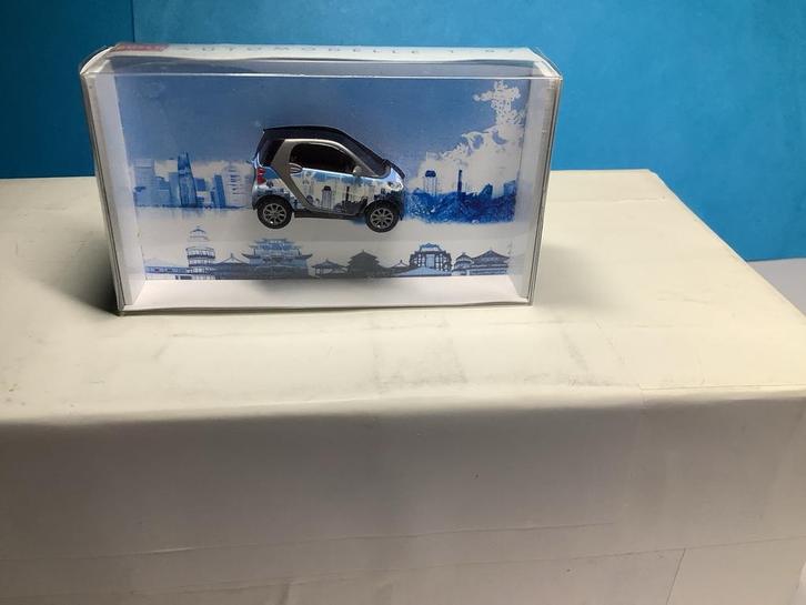 Smart Fortwo 07 Puzzlesmart Skyline modelauto, Hobby en Vrije tijd, Modelauto's | 1:87, Nieuw, Auto, Overige merken, Ophalen of Verzenden