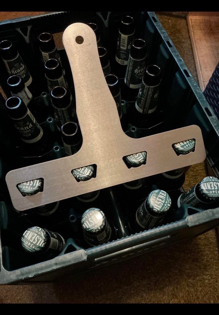 RVS. Vier dubbele bier flessen opener. Van roest vrij staal., Huis en Inrichting, Ophalen of Verzenden, Zo goed als nieuw