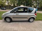 Peugeot 1007 1.4 2006 Grijs, Auto's, Voorwielaandrijving, 15 km/l, 1360 cc, 4 cilinders