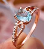 18K goud verguld ring met ovale licht blauwe zirkoon, Overige materialen, Nieuw, Ophalen of Verzenden, 17 tot 18