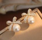 Goudkleurige parel strik oorbellen bow earrings elegant new, Ophalen of Verzenden, Nieuw, Dame of Heer, Met edelsteen