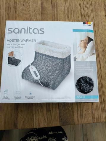 Voetenverwarmer nieuw in de verpakking beschikbaar voor biedingen