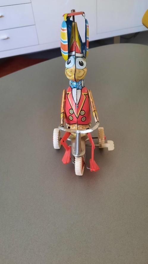 Blikken eend op fiets leuke werking, Antiek en Kunst, Antiek | Speelgoed, Ophalen of Verzenden
