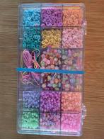 Kraaltjes sieraden maken, Ophalen