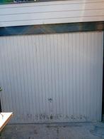 Garagedeur met afstandsbediening, Ophalen