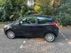 Ford Ka 1.2 51KW 2010 Zwart, Auto's, Voorwielaandrijving, Stof, 4 cilinders, 4 stoelen