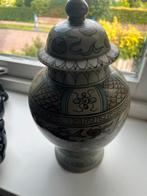 Chinese Oude Dekselvaas, Ophalen