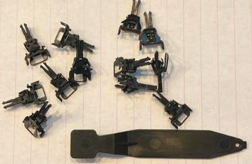 12 Märklin kortkoppelingen met ontkoppelhulpstuk beschikbaar voor biedingen