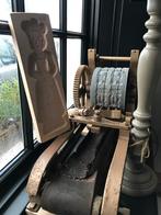 Antieke zware speculaasmachine, Ophalen