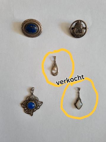 3 antieke zilveren sieraden.2 broches en 1 hanger. beschikbaar voor biedingen