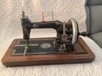 antieke naaimachine, Ophalen