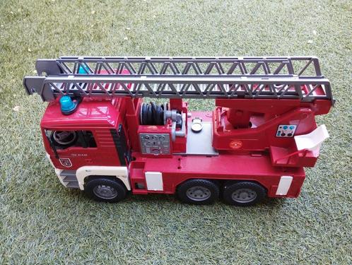 Bruder MAN brandweerauto, Kinderen en Baby's, Speelgoed | Speelgoedvoertuigen, Gebruikt, Ophalen of Verzenden