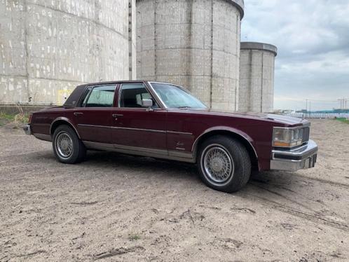 Cadillac Seville 5.7 Fuel INJ AUT 1977 Rood, Auto's, Cadillac, Particulier, Seville, Airconditioning, Boordcomputer, Centrale vergrendeling