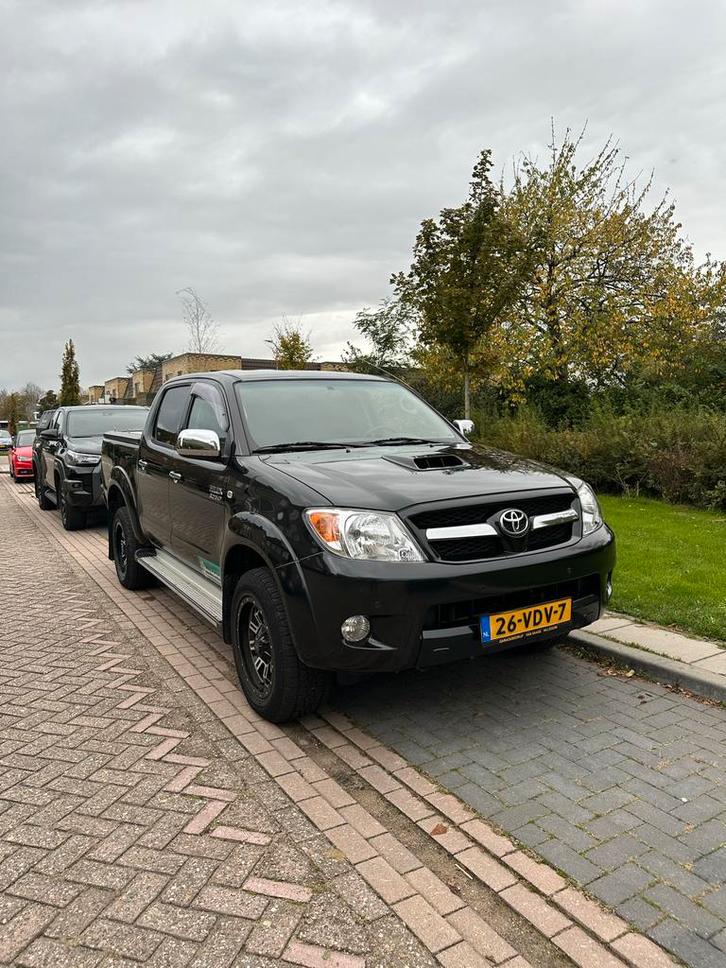 Toyota Hi-lux 3.0 D-4d DC 4WD AUT 2007, Auto's, Bestelauto's, Particulier, Toyota, Diesel, Automaat, Origineel Nederlands, Zwart