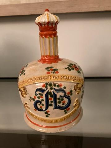 ‘Oranje’ kruik compleet met ‘kroonkurk’. 1939.  beschikbaar voor biedingen