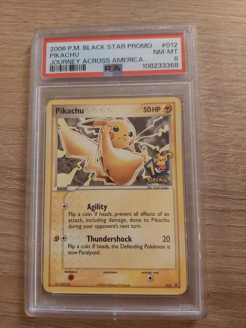 Pikachu Journey across America promo psa8, Hobby en Vrije tijd, Verzamelkaartspellen | Pokémon, Zo goed als nieuw, Ophalen of Verzenden