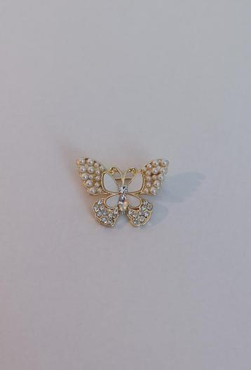 Vlinder broche beschikbaar voor biedingen