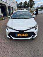 Toyota Corolla TS 1.8 Hybrid 122pk CVT 2021 Wit, Auto's, 4 cilinders, Wit, Stationwagon, Te koop