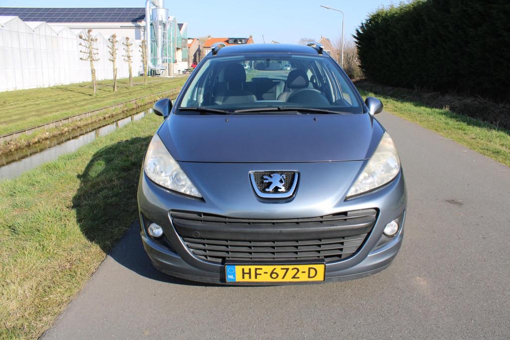 Peugeot 207 SW 1.4 VTi X-line met Airco en Panoramadak, Auto's, Voorwielaandrijving, Euro 5, Gebruikt, Metallic lak