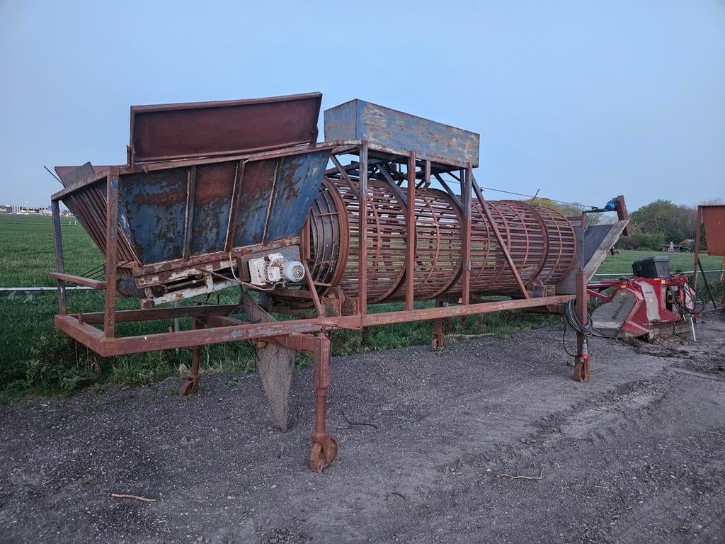 Trommelzeef voor gekloofd hout. Zeeftrommel. Houtkloven., Ophalen