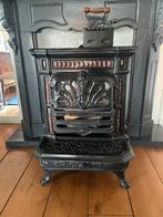 Antiek Godin kacheltje te koop, Ophalen