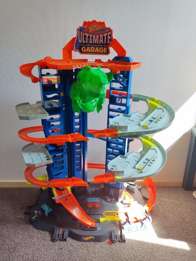 Hot Wheels baan met dino ultimate garage, Kinderen en Baby's, Speelgoed | Racebanen, Ophalen of Verzenden, Hot Wheels, Handmatig
