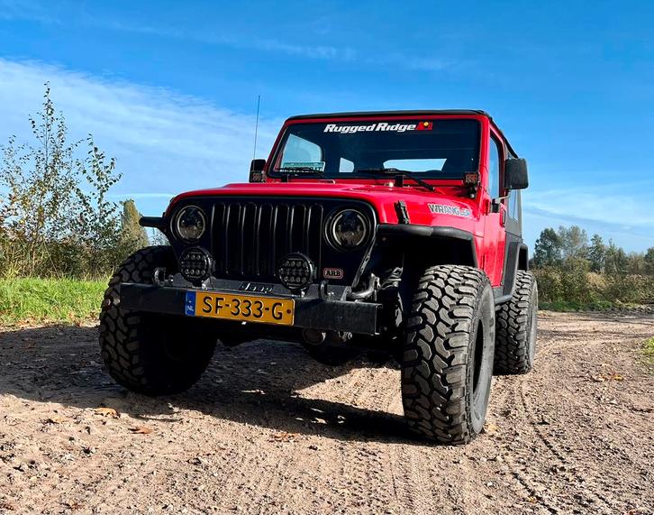 Jeep Wrangler TJ 4.0 L MY1997 handbak, Auto's, Jeep, Particulier, Wrangler, LED verlichting, Lichtmetalen velgen, Mistlampen, Radio