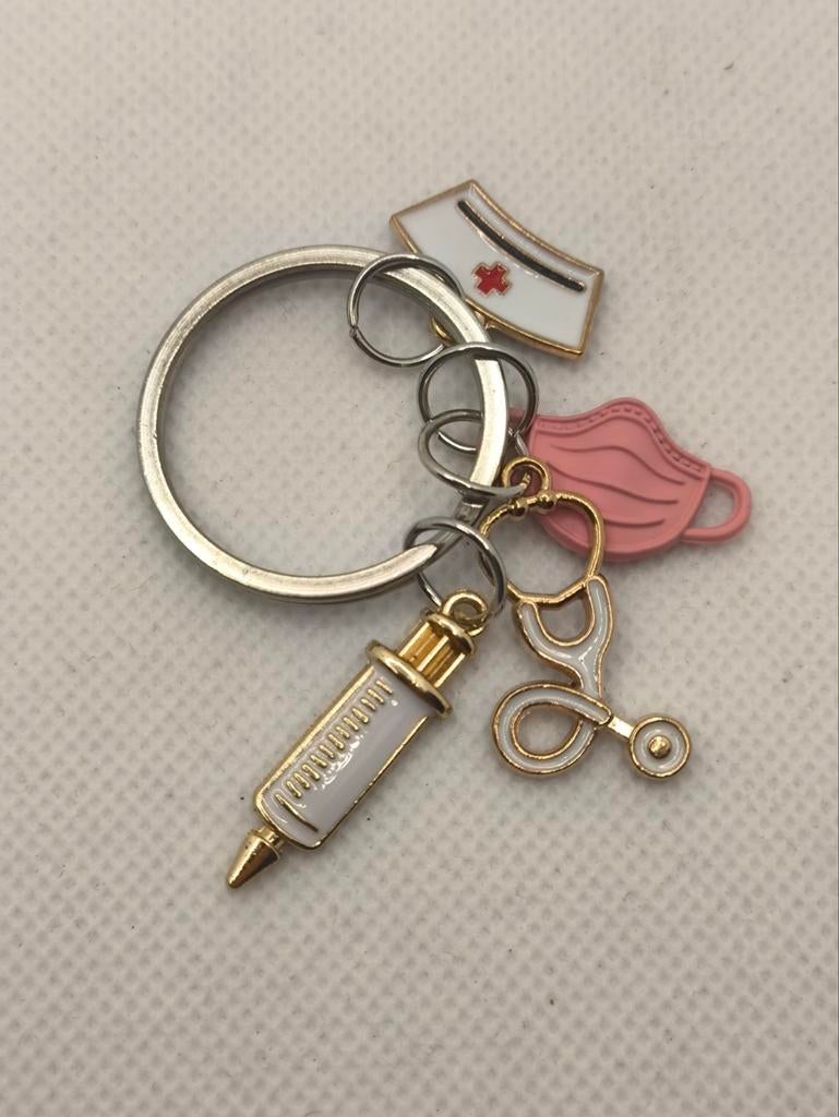 Leuke roze verpleegster sleutelhanger - nieuw, Ophalen of Verzenden, Nieuw