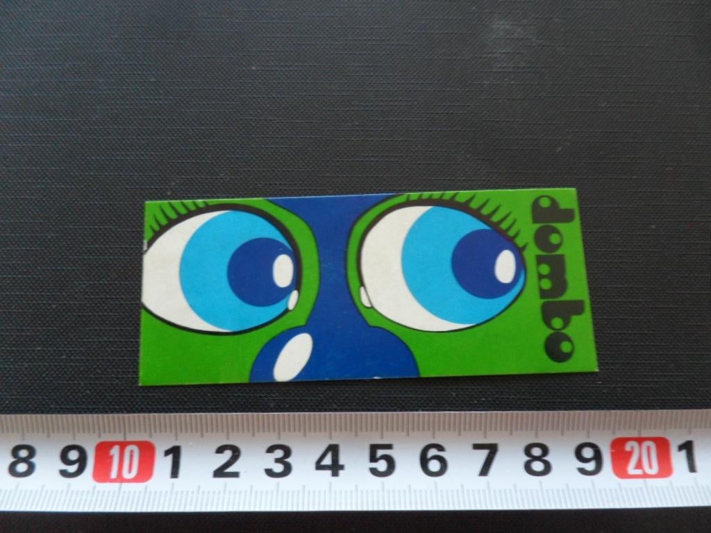 sticker dombo groen blauw strip ogen, Ophalen, Zo goed als nieuw