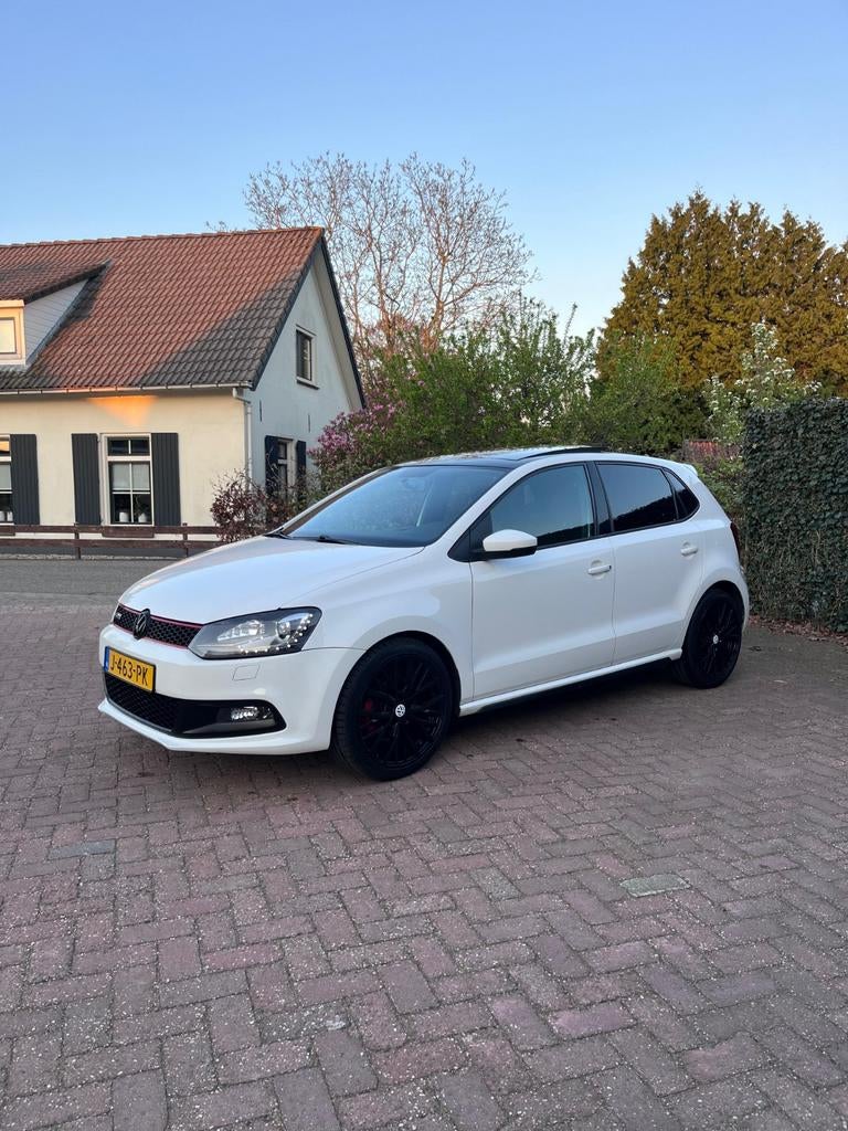 Volkswagen Polo 1.4 GTI DSG 2011 Wit, Auto's, Automatische klimaatregeling, Stof, 1169 kg, Zwart