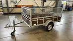 Aanhangwagen met loofrekken, Ophalen, Gebruikt
