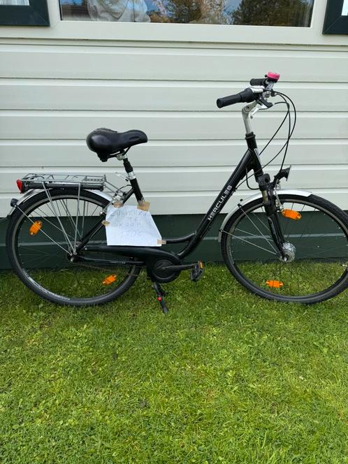 Hercules damesfiets met versnellingen en verende voorvork, Fietsen en Brommers, Fietsen | Dames | Moederfietsen, Zo goed als nieuw