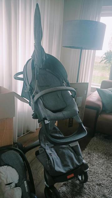 Mooie stokke kinderwagen. ,