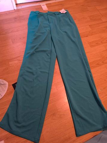 Turquoise wijde pijpen broek - Maat L beschikbaar voor biedingen