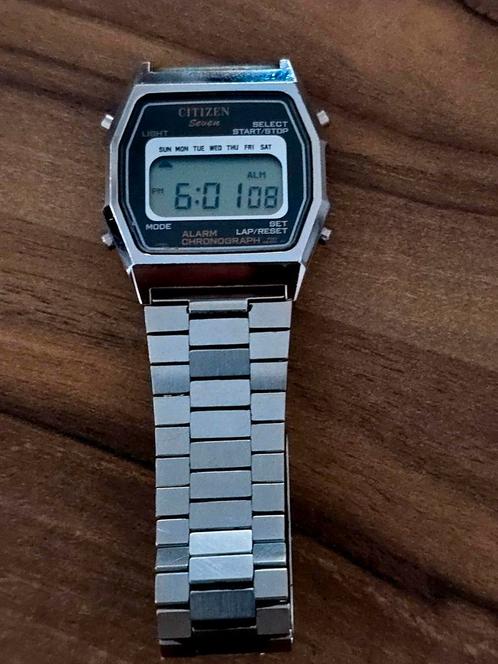 De Citizen Seven ST-6039 is een vintage LCD-horloge, Sieraden, Tassen en Uiterlijk, Horloges | Antiek, Overige merken, Staal, Ophalen of Verzenden